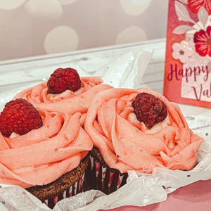 Chocolate Nutella Stuffed Cupcakes with Raspberry Frosting